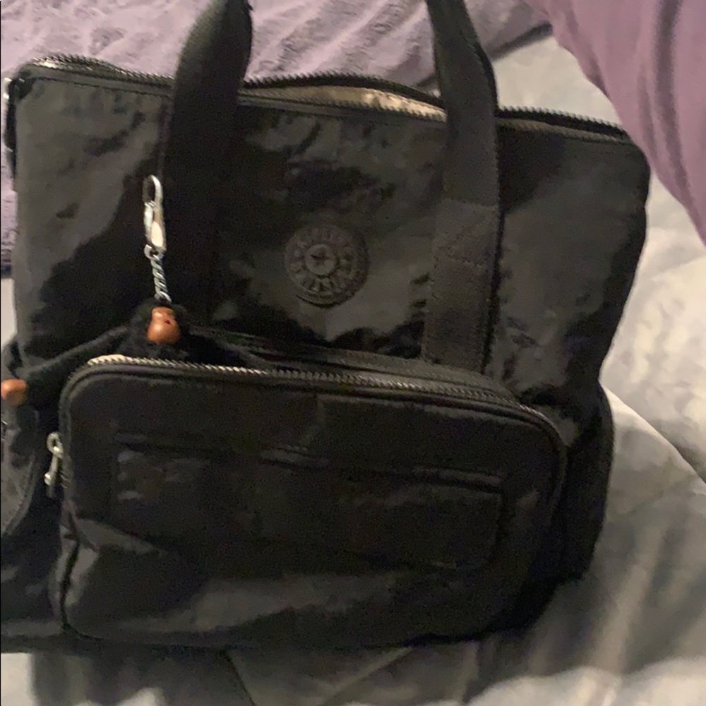 Beautiful Kipling black canvas bag/backpack.